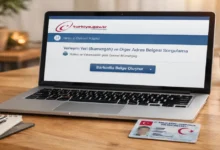 e-Devlet üzerinden ikametgah belgesi online alma ekranını gösteren laptop ve masa düzeni